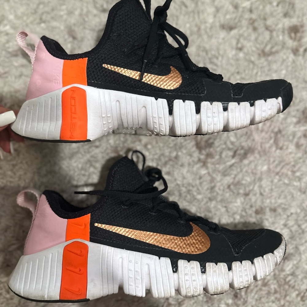Nike Black and Orange Sneakers with Pink and Gold Accents